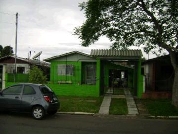 Casa com 3 dormitórios e garagem, localizada em São Leopoldo