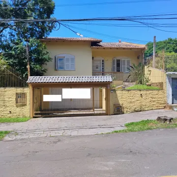 Oportunidade no Morro do Espelho! Casa com suíte e garagem para 2 Carros