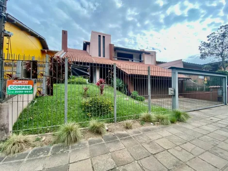 Casa com 5 dormitórios e piscina à venda no Bairro Padre Réus em São Leopoldo.