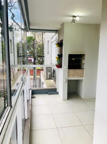 Apartamento semi mobiliado, 2 quartos, suíte e 2 vagas de garagem no Bairro Morro do Espelho em São Leopoldo.